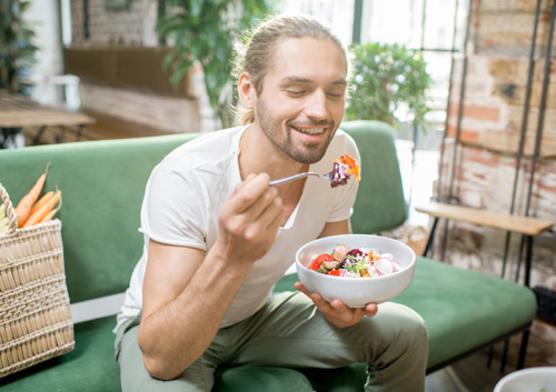 man eating healthy salad