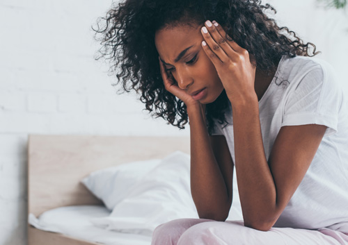 woman suffering from headache